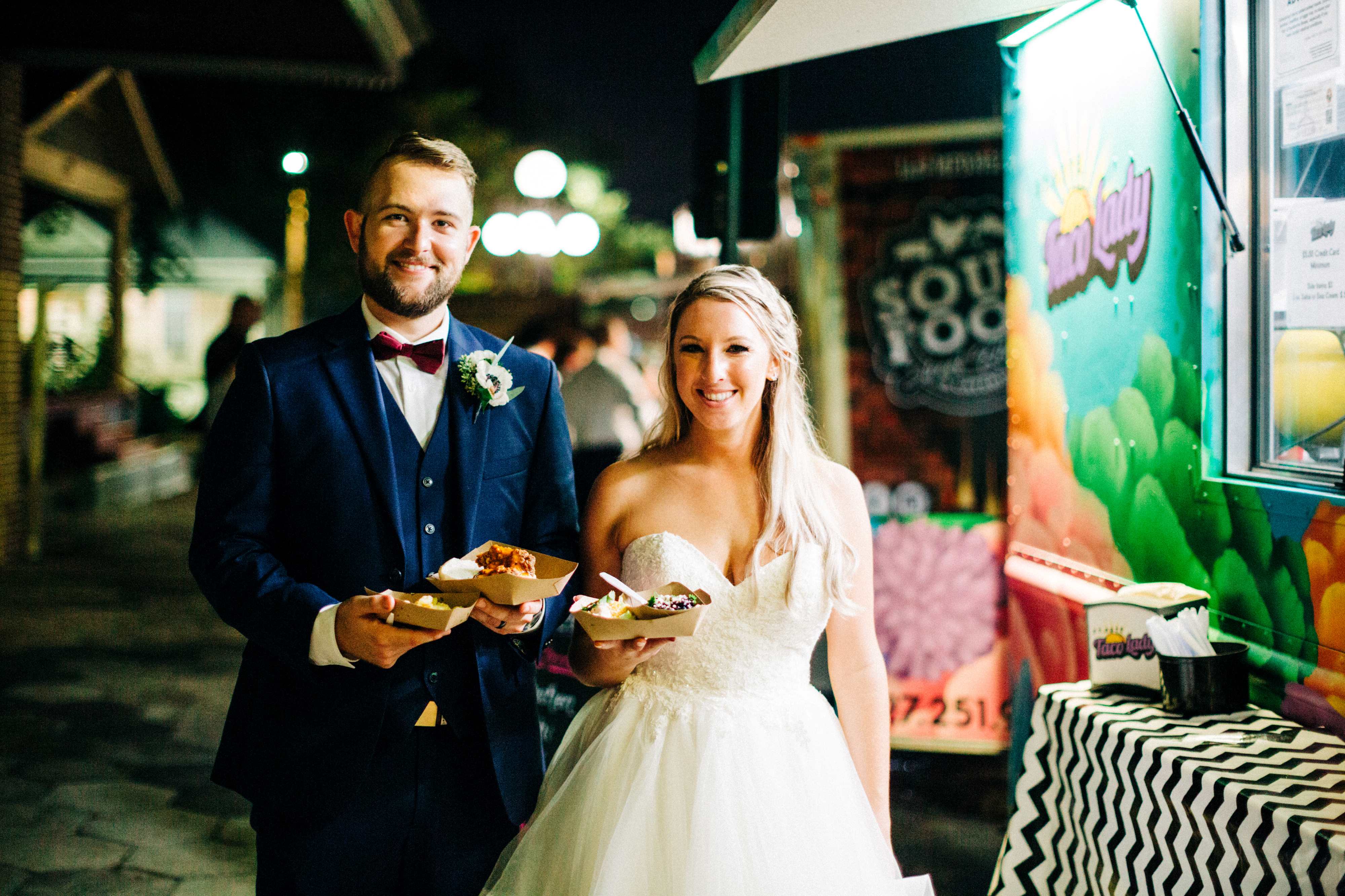 Bride and Groom with Food from Food Trucks