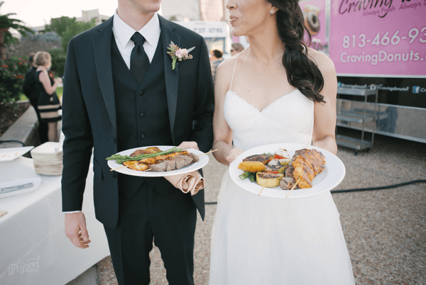 Bride and Groom with Food from Food Trucks