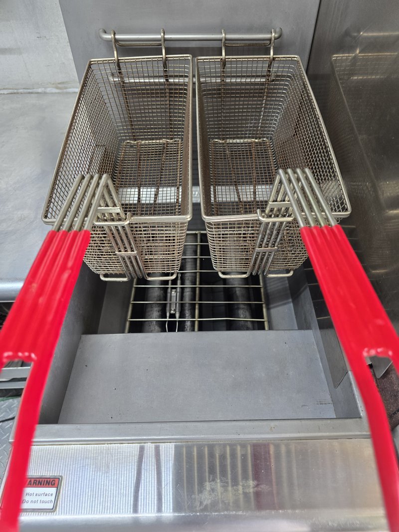 Double basket deep fryer in food truck
