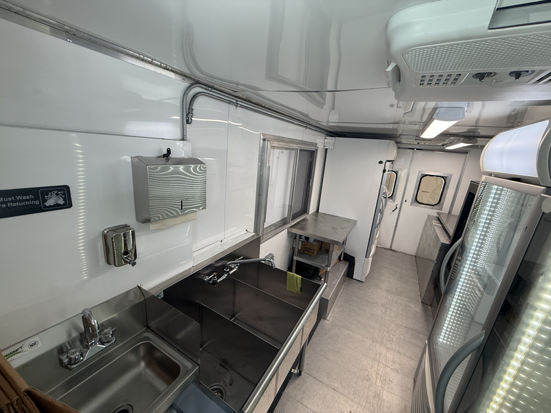 Kitchen Area on Cold Truck Sinks and back of truck