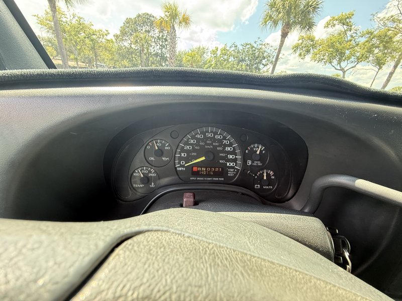 Odometer reading 142,000 miles on a 1997 Chevrolet Express 3500 shaved ice truck for sale in Tampa Bay, Florida