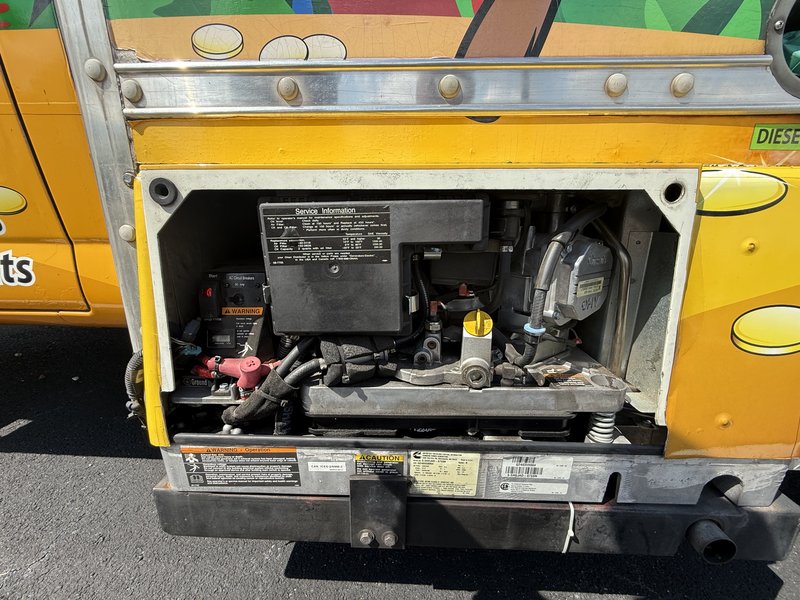 Cummins Onan 5.5HGJAD-6759N onboard generator on a shaved ice food truck for sale in Tampa, FL — 5.5 kW gasoline